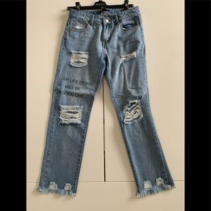 Baggy ripped Jeans with writings